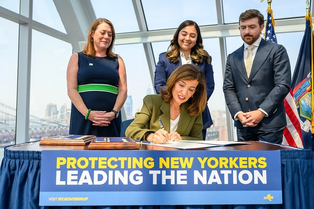 Gov. Kathy Hochul signing the July 14, 2026 executive order launching a one‑year moratorium on new hyperscale data centers &mdash; a direct visual of the policy action that immediately affected data‑center developers such as TeraWulf.