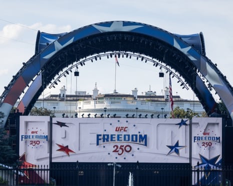 UFC Freedom 250 stage with the White House visible beyond &mdash; shows the event staged on federal grounds and the visual context for the USD1 stablecoin sponsorship.